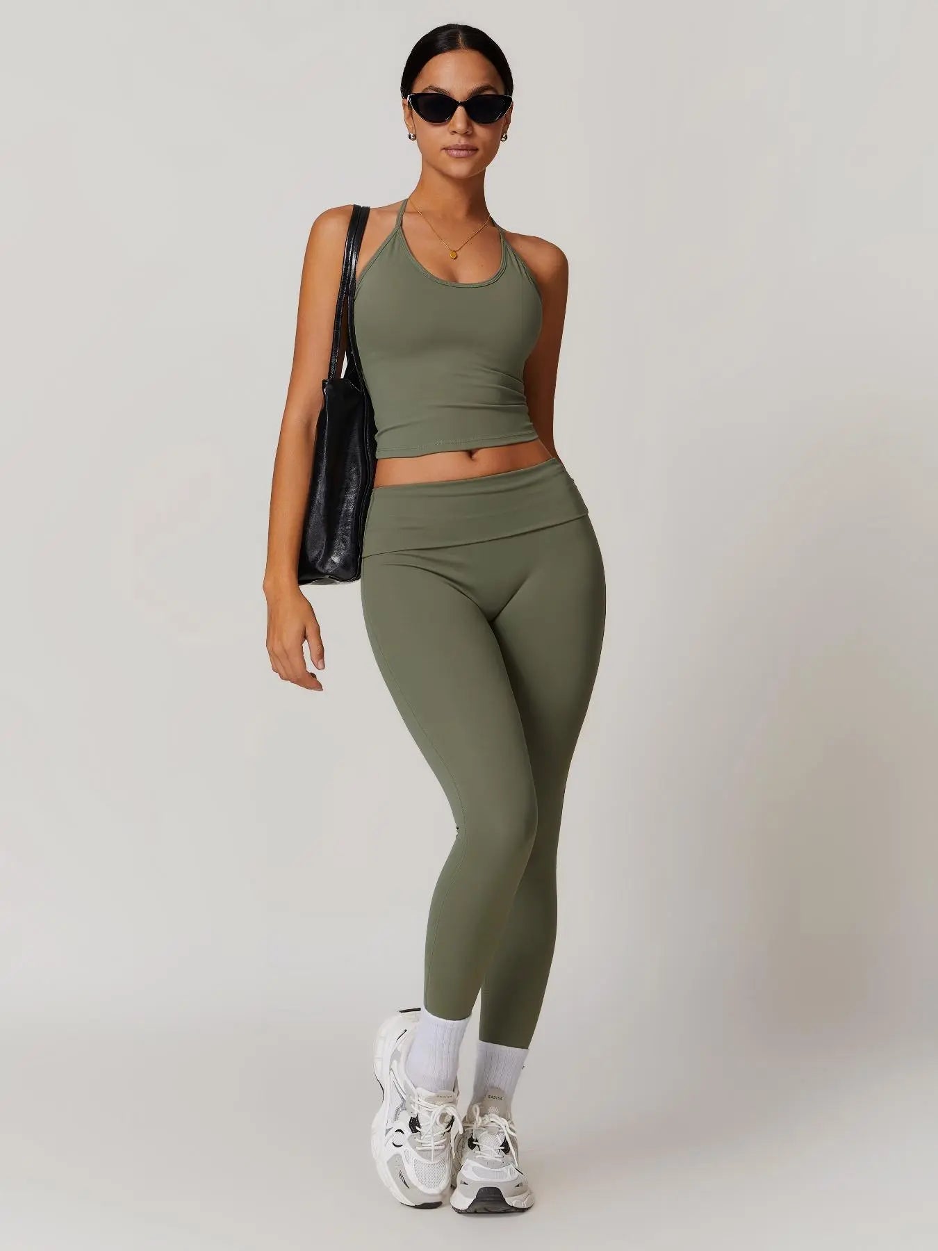 Two-Piece Set Women's Solid Backless Halter Crop Top & Fold Over Waist Leggings Tracksuit Set, Casual…